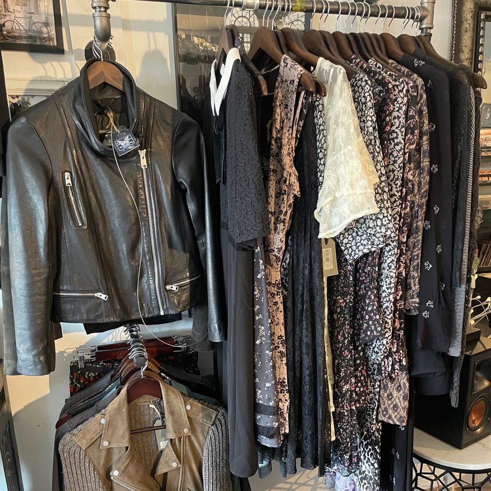 50 item collection of All Saints dressss and leather jackets.